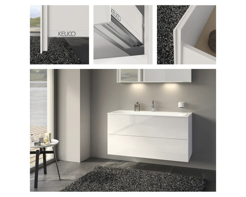 Badezimmer mit Waschtischunterschrank, Waschbecken und Spiegel