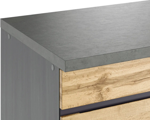 Detailansicht eines Badezimmermöbels mit Betonarbeitsplatte und Holzfronten