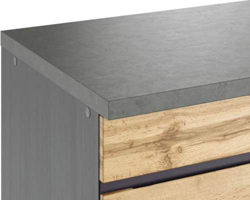 Detailansicht eines Waschtischunterschranks mit Betonarbeitsplatte und Holzfronten