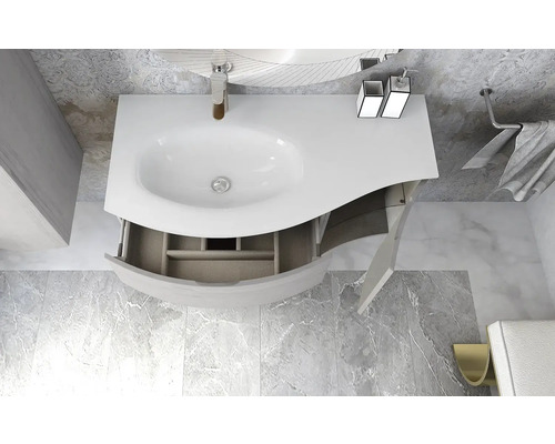 Waschtisch mit offenem Unterschrank und Armaturen in einem Badezimmer