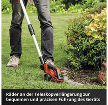 Rasentrimmer mit Teleskopverlängerung im Einsatz zur Rasenpflege