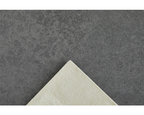 Detailansicht einer hellen Filzunterlage auf dunklem Untergrund