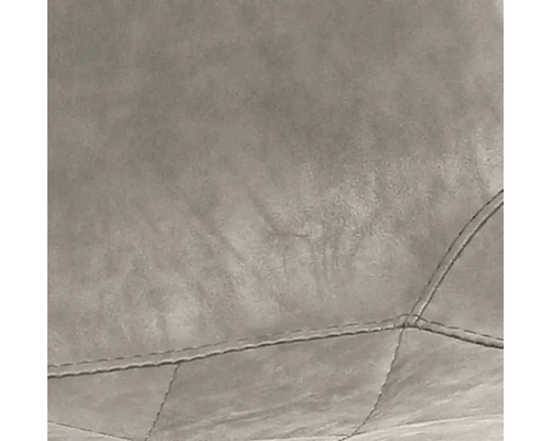 Detailaufnahme eines Polstermöbels mit gesteppter Oberfläche