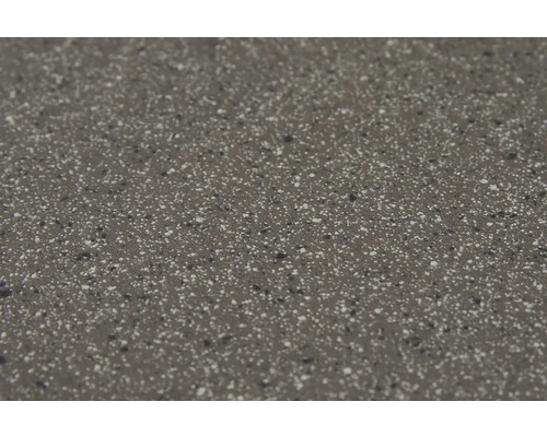 Nahaufnahme einer grauen Arbeitsplatte mit Sprenkeln