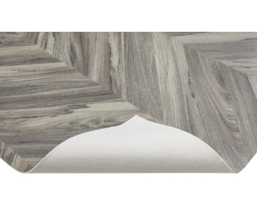 Vinylboden im Fischgrätenmuster mit weißer Rückseite