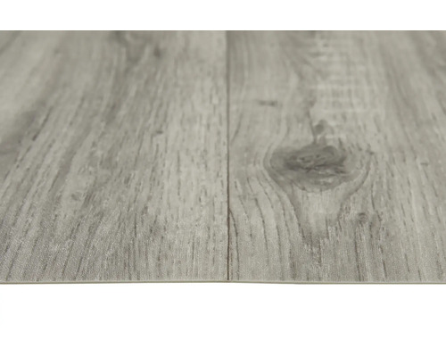 Nahaufnahme eines grauen Vinylbodens mit Holzoptik.