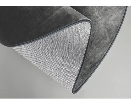 Nahaufnahme eines grauen runden Teppichs