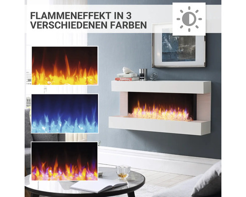 Elektrischer Kamin mit Flammen in drei verschiedenen Farben in einem hellen Wohnzimmer.