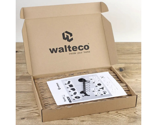 Offener Karton mit Produktverpackung und Anleitung