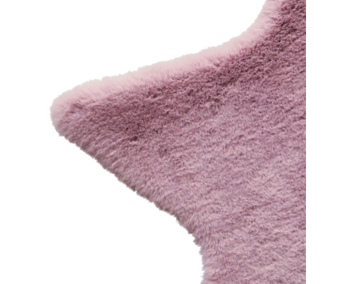 Detailaufnahme eines Sternförmigen Teppichs mit weicher Oberfläche