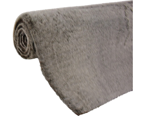 Grauer Teppichläufer auf einer Rolle