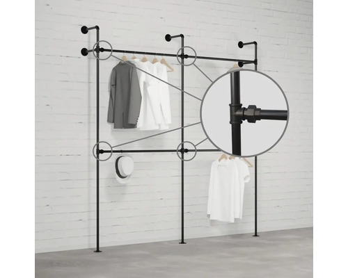 Schwarze Kleiderstange mit Kleidung und Detailaufnahme der Rohre