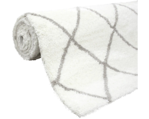 Gerollter Teppich mit geometrischem Muster