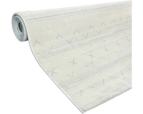 Aufgerollter Teppich mit Muster