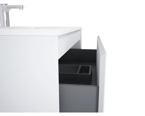 Waschtischunterschrank mit geöffneter Schublade und Waschtischarmatur