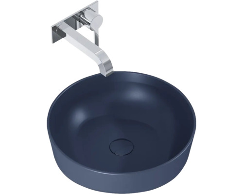 Blaues Aufsatzwaschbecken mit Wandarmatur