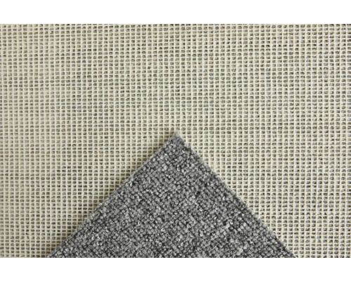 Rückseite eines grauen Teppichs mit Antirutschbeschichtung