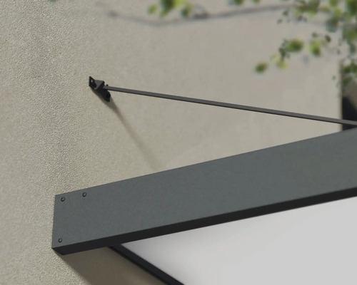 Detailansicht einer grauen Haustürüberdachung an einer Hauswand.