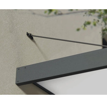 Detailaufnahme einer Haustürüberdachung an einer Hauswand