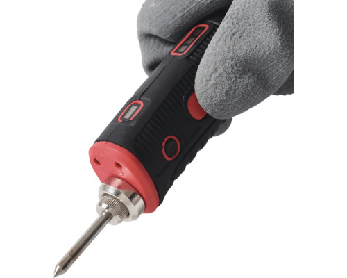 Lötkolben in Hand mit Schutzhandschuh
