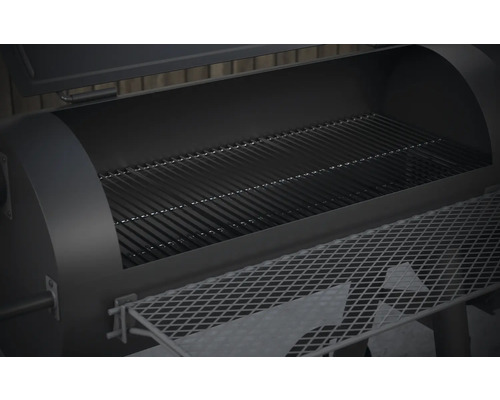 Innenansicht eines offenen Grills mit Grillrost und Ablagefläche