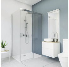 Modernes Badezimmer mit Duschkabine, Waschtisch und Toilette.