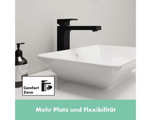 Waschbecken mit schwarzer Armatur und Comfort Zone Symbol