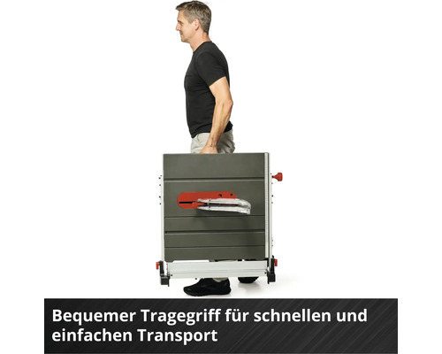 Mann transportiert Tischkreissäge mit Tragegriff