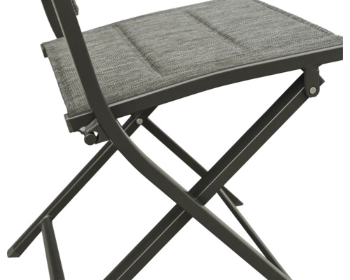 Detailansicht eines Klappstuhls mit Textilbezug