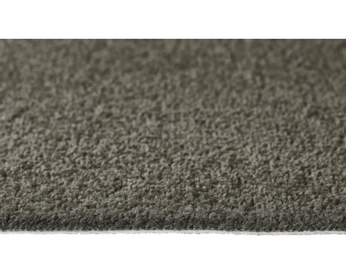 Nahaufnahme eines grauen Teppichs.