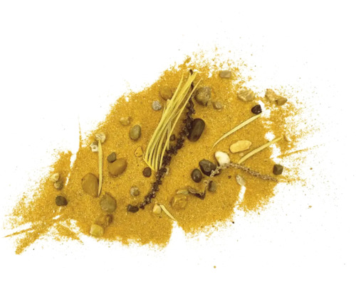 Sand mit Steinen und Pflanzenresten