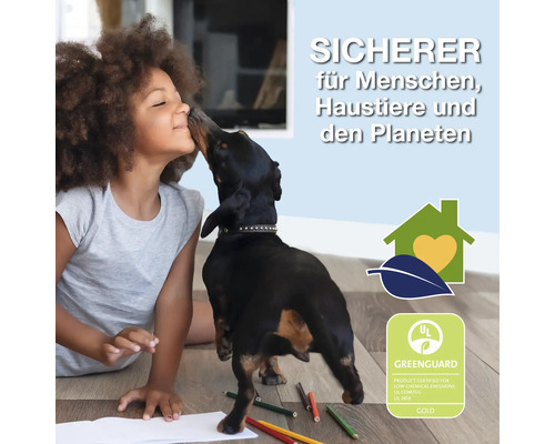 "Kind und Dackel spielen auf dem Boden