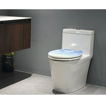 Toilette mit Toilettensitz mit Strandmotiv in einem Badezimmer