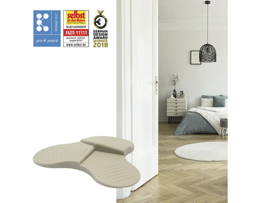 Türstopper vor einer offenen Tür mit Blick in ein Schlafzimmer