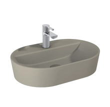 Aufsatzwaschbecken in ovaler Form mit Armatur