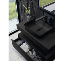 Modernes Badezimmer mit schwarzem Waschtisch, Aufsatzwaschbecken, Armatur und offenem Schubfach