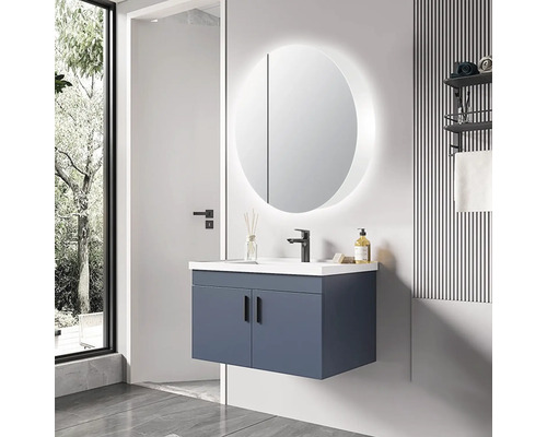 Modernes Badezimmer mit Waschbeckenunterschrank, runden Spiegel mit Beleuchtung und Armatur