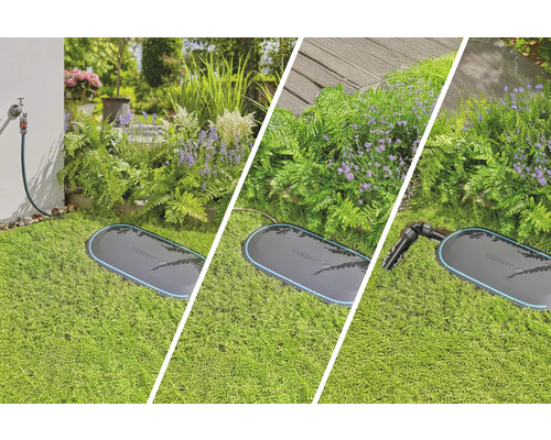 Gardena Pipeline Wasserdose im Garten mit Blumen und Rasen