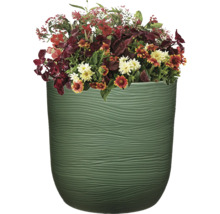 Blumenarrangement in einem Dekorationstopf mit Rillenstruktur