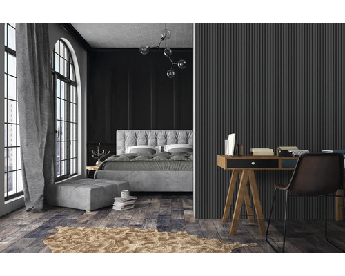 Schlafzimmer mit Bett, Schreibtisch und Wandpaneelen