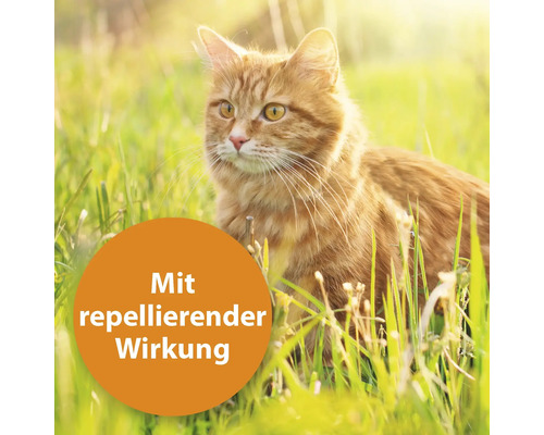 Katze im Gras mit dem Hinweis ''Mit repellierender Wirkung''