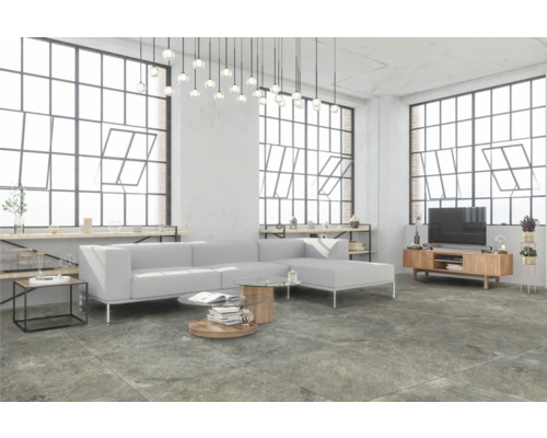 Wohnzimmer mit großem Sofa, Couchtisch und Fernseher in modernem Design