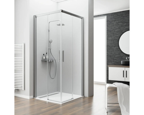 Badezimmer mit Duschkabine, Waschtisch und Handtuchwärmer