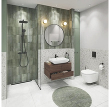 Modernes Badezimmer mit Dusche, Waschtisch, Spiegel und Toilette.