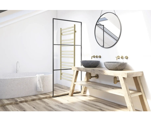 Helles Badezimmer mit Badewanne, Waschtisch mit zwei Waschbecken und Heizkörper