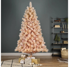 Dekorativer Weihnachtsbaum aus Kunststoff mit Geschenken im Wohnzimmer.