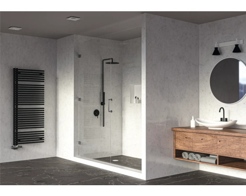 Badezimmer mit Dusche, Waschtisch und Heizkörper