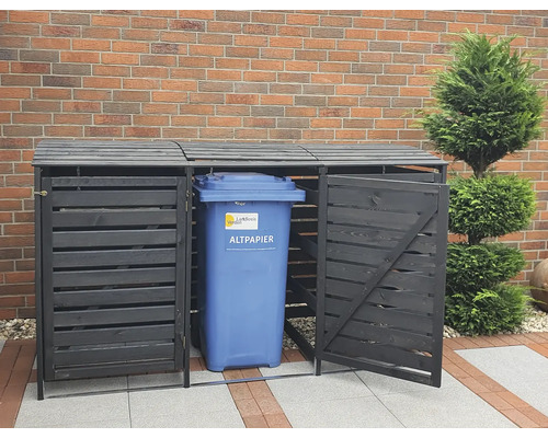 Mülltonnenbox aus Holz mit einer blauen Altpapiertonne