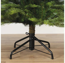 Detailaufnahme eines Weihnachtsbaums mit schwarzem Metallfuß