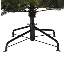 Detailaufnahme des schwarzen Metallfußes eines Weihnachtsbaums zur Stabilisierung.